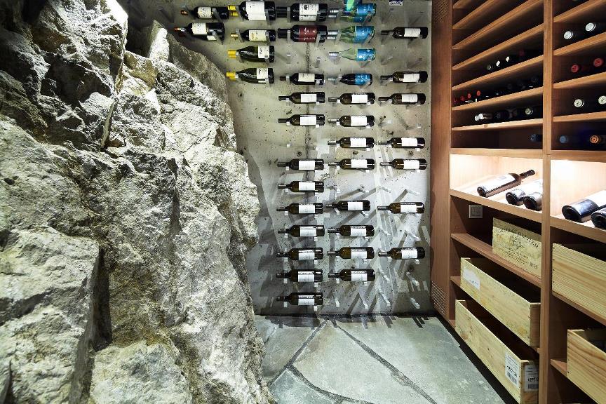 Dallas-Fort Worth Transitional custom wine cellar with Metal and Wooden Wine Racks