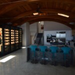 This beautiful kitchen wine closet is a stunning addition to this modern Dallas-Fort Worth home.
