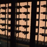 Label forward racking and a full length display row allow for lots of storage and easy visibility and access to your wine collection. custom-wine-rack-with-white-back-panel