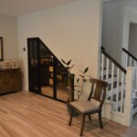 The space under these stairs wasn't being used, and has now been turned into a gorgeous and practical home wine cellar. wine-cellar-below-stairs-in-dallas-fort-worth-arizona
