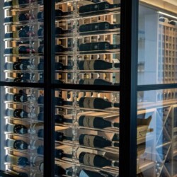 5 - Modern Wine Racks in a Glass-enclosed Cellar Modern Wine Racks in a Glass-enclosed Cellar